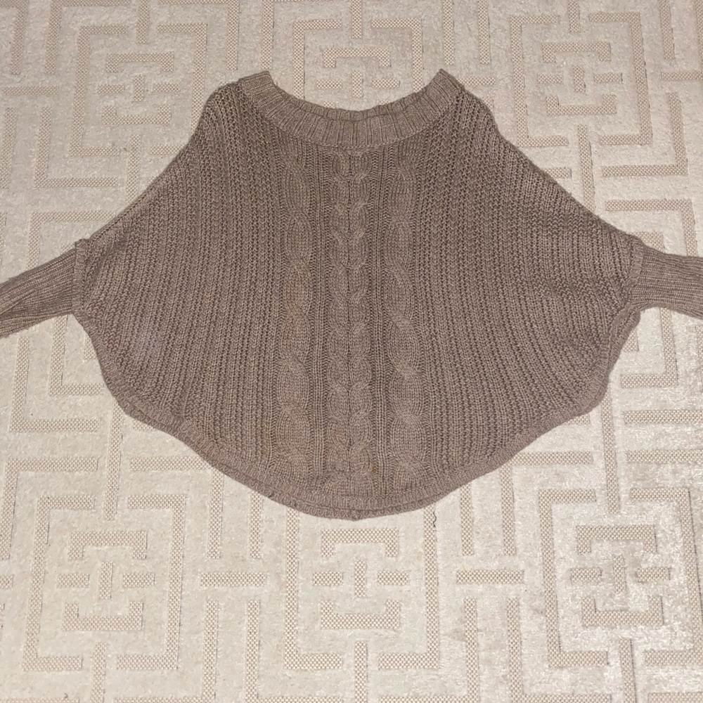 So cozy! Cable knit poncho